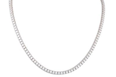 Lot 304 - A DIAMOND LINE NECKLACE, the brilliant cut...