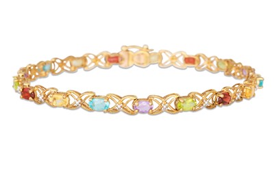 Lot 220 - A MULTICOLOURED GEM-SET BRACELET, mounted in...