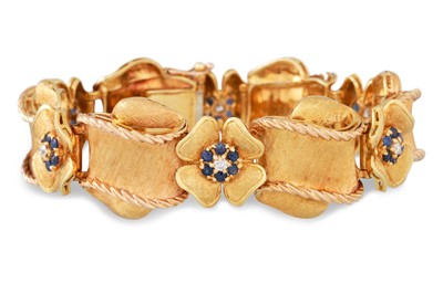 Lot 227 - A VINTAGE 18CT GOLD PANEL BRACELET, set with...