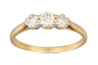 Lot 228 - A THREE STONE DIAMOND RING, mounted in 18ct...