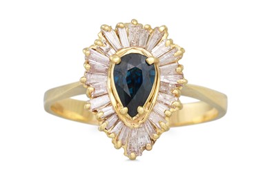 Lot 332 - A DIAMOND AND SAPPHIRE CLUSTER RING, the pear...