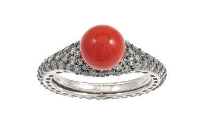 Lot 265 - A CORAL AND DIAMOND RING, the coral bead to a...
