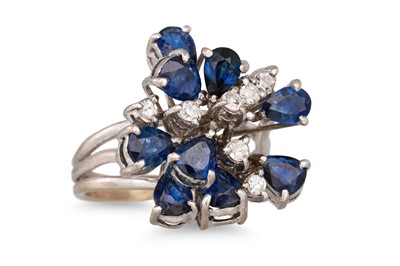 Lot 24 - A SAPPHIRE AND DIAMOND CLUSTER RING, of...