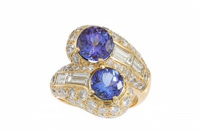 Lot 266 - A TANZANITE AND DIAMOND CLUSTER RING, of...