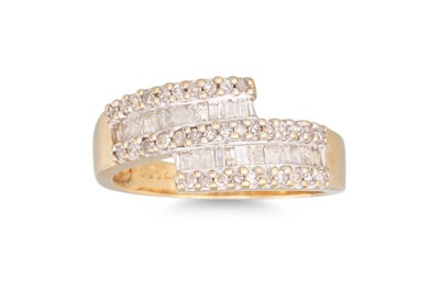 Lot 1 - A DIAMOND CROSSOVER RING, mounted in 9ct...