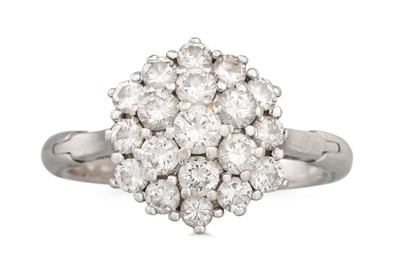 Lot 234 - A DIAMOND CLUSTER RING, of unusual expanding...