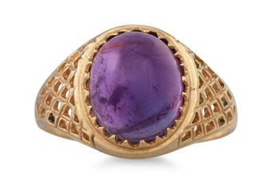 Lot 235 - A CABOCHON AMETHYST SET DRESS RING, mounted in...