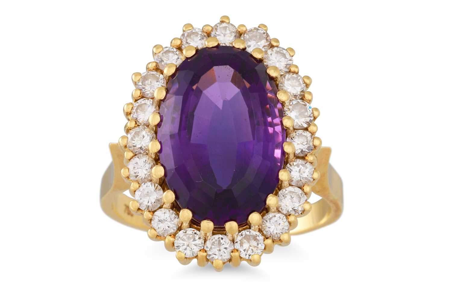 Lot 121 - AN AMETHYST AND DIAMOND CLUSTER RING, the oval...