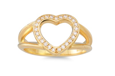 Lot 129 - A CHOPARD DIAMOND SET RING, heart shaped in...