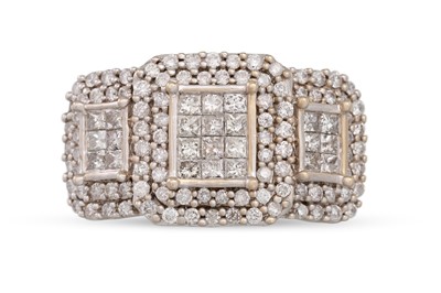 Lot 187 - A DIAMOND CLUSTER RING, set with princess and...