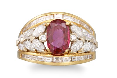 Lot 243 - A RUBY AND DIAMOND CLUSTER RING, the oval ruby...