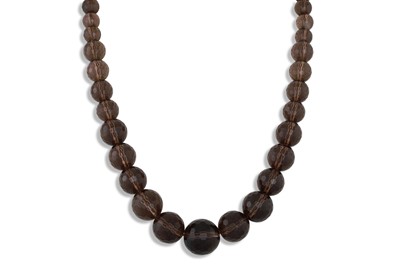 Lot 93 - A MULTI FACETED SMOKEY QUARTZ NECKLACE, with a...