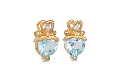 Lot 63 - A PAIR OF DIAMOND AMD TOPAZ EARRINGS, set with...