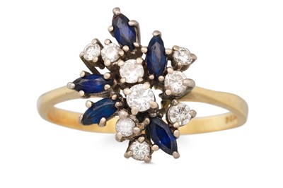 Lot 11 - A DIAMOND AND SAPPHIRE DRESS RING, mounted in...