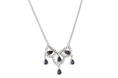 Lot 237 - A DIAMOND AND SAPPHIRE NECKLACE, of shaped...