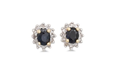 Lot 17 - A PAIR OF DIAMOND AND SAPPHIRE CLUSTER...