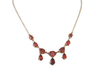 Lot 20 - AN ANTIQUE GARNET NECKLACE, the pear, and oval...