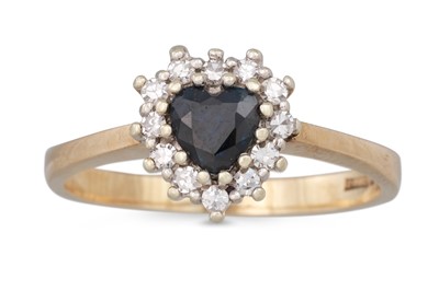 Lot 33 - A SAPPHIRE AND DIAMOND CLUSTER RING, the heart...