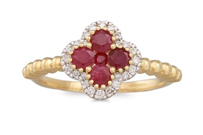 Lot 39 - A RUBY AND DIAMOND CLUSTER RING, the central...