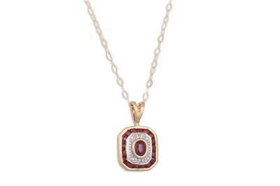 Lot 73 - A DIAMOND AND RUBY PENDANT, on a chain