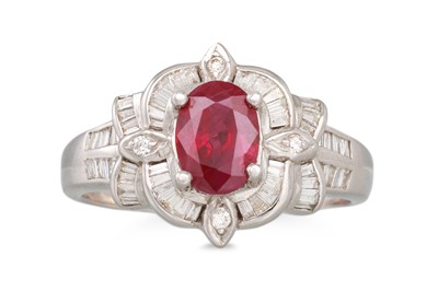 Lot 345 - A RUBY AND DIAMOND RING, the oval ruby to...