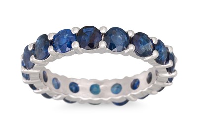 Lot 384 - A SAPPHIRE ETERNITY RING, circular stones...