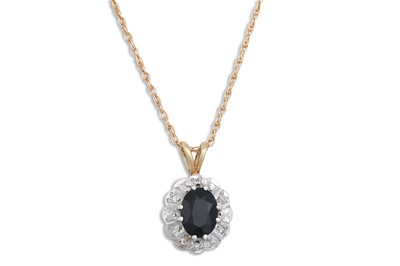 Lot 282 - A DIAMOND AND SAPPHIRE PENDANT, mounted in...