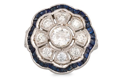 Lot 295 - A VINTAGE DIAMOND AND SAPPHIRE DAISY CLUSTER...