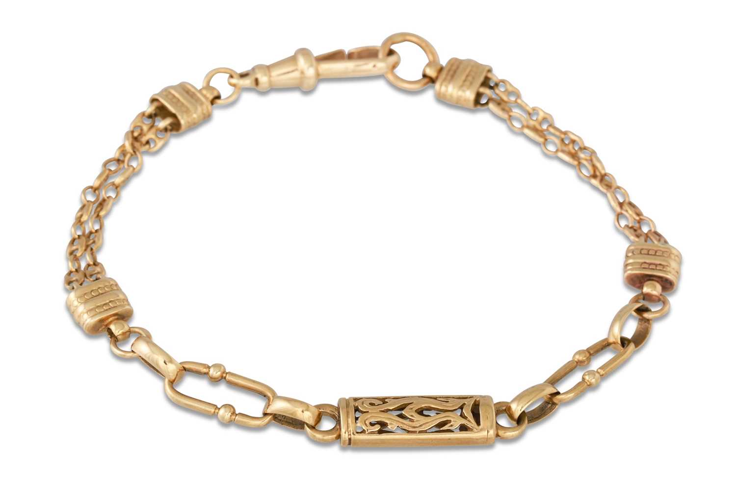 Lot 101 - A 9CT YELLOW GOLD FANCY LINK BRACELET, 10 g.