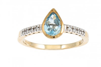 Lot 98 - A TOPAZ RING, the pear shaped topaz to diamond...