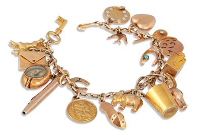 Lot 362 - A GOLD CHARM BRACELET, suspending various...