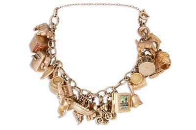 Lot 363 - A GOLD CHARM BRACELET, suspending various...