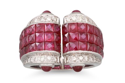 Lot 193 - A RUBY AND DIAMOND RING, the shaped ring set...