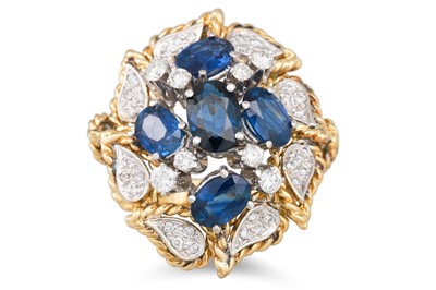 Lot 210 - A SAPPHIRE AND DIAMOND CLUSTER RING, set with...