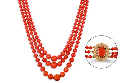 Lot 226 - A THREE STRANDED CORAL NECKLACE, to a gold and...