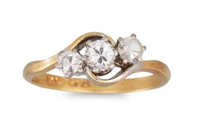 Lot 390 - A DIAMOND THREE STONE RING, of twist form,...