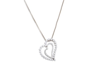 Lot 51 - A DIAMOND PENDANT, the heart shaped pendant...