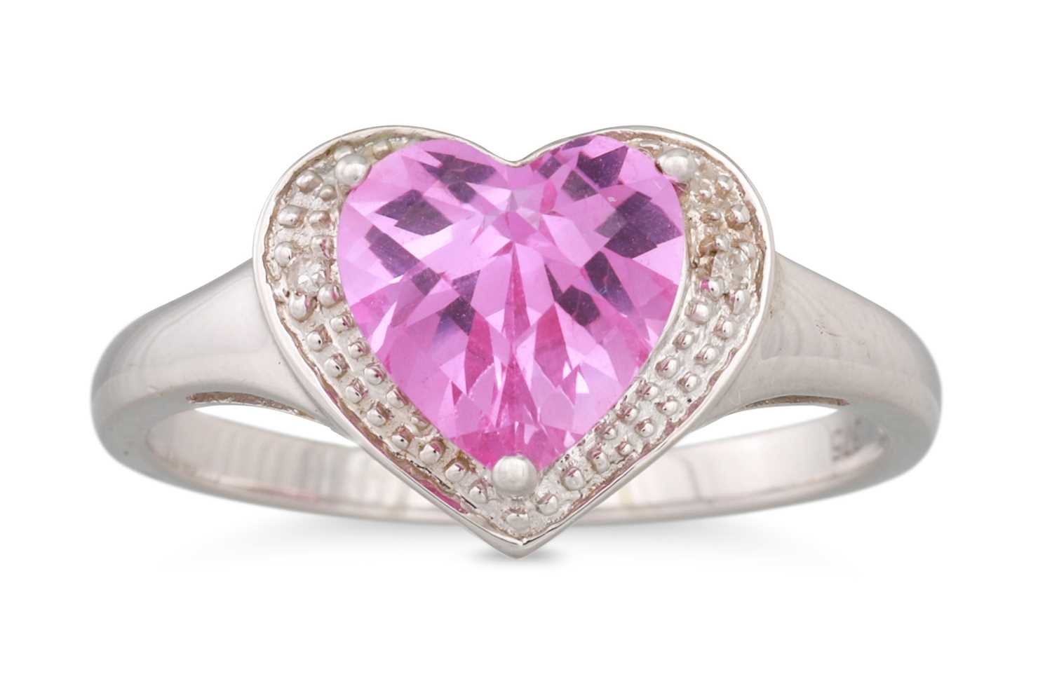 Lot 19 - A HEART SHAPED CLUSTER RING, the heart shaped...