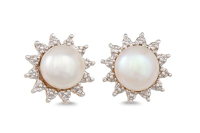 Lot 21 - A PAIR OF DIAMOND AND PEARL EARRINGS, cream...