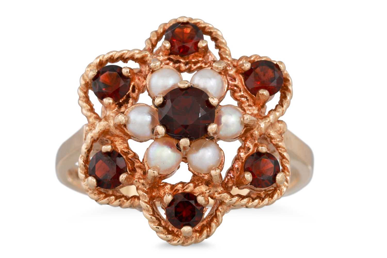 Lot 71 - A GARNET AND PEARL CLUSTER RING, mounted in...