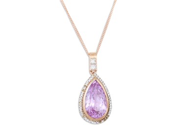 Lot 165 - A DIAMOND AND AMETHYST PENDANT, the pear...