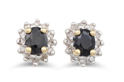 Lot 166 - A PAIR OF DIAMOND AND SAPPHIRE CLUSTER...