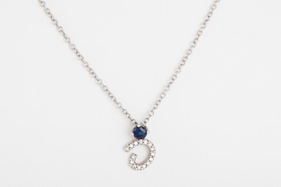 Lot 211 - A SAPPHIRE AND DIAMOND PENDANT, mounted in 9ct...