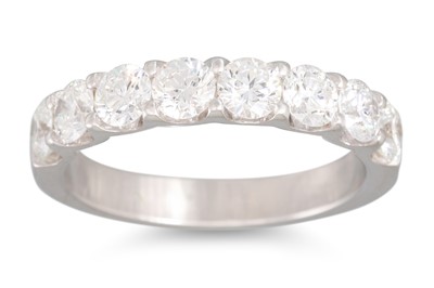 Lot 225 - A DIAMOND HALF ETERNITY RING, the brilliant...