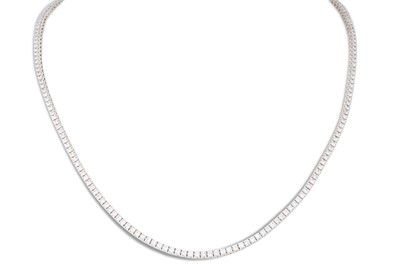 Lot 245 - A DIAMOND LINE NECKLACE, the brilliant cut...