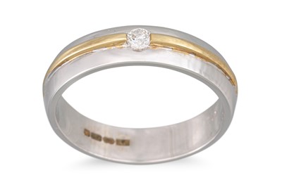 Lot 103 - A DIAMOND RING, mounted in two colour gold,...