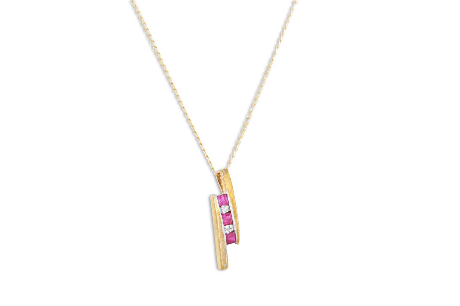 Lot 58 - A RUBY AND DIAMOND PENDANT, mounted in 9ct...