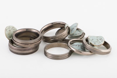 Lot 9 - A COLLECTION OF METAL RINGS, stamped TR