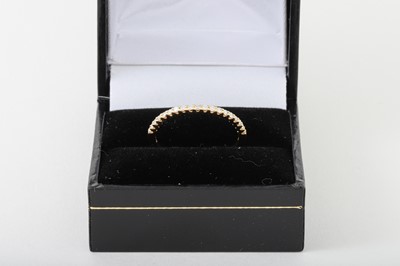 Lot 79 - A DIAMOND HALF ETERNITY RING, mounted in 18ct...