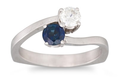 Lot 206 - A DIAMOND AND SAPPHIRE TOI ET MOI RING, the...